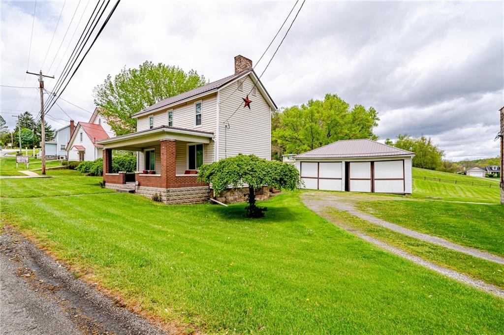2375 Mt Pleasant Road Ruffs Dale, PA 15679 - Photo 31 of 31 a view of a house with a backyard