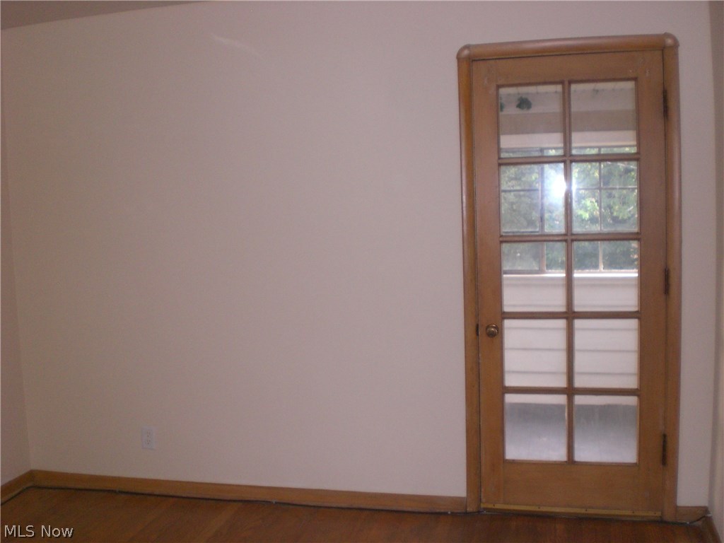 8401-03 Pelham Drive Parma, OH 44129 - Photo 15 of 18 ENCLOSED BACK PORCH OFF THE SMALLER BEDROOM