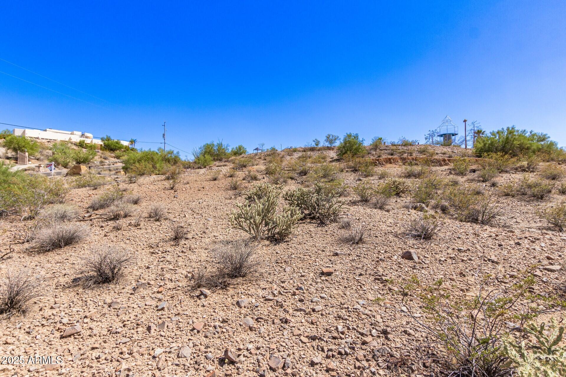 9303 West Briles Road, Unit 4 Peoria, AZ 85383 - Photo 11 of 20 a view of a large building with sky view