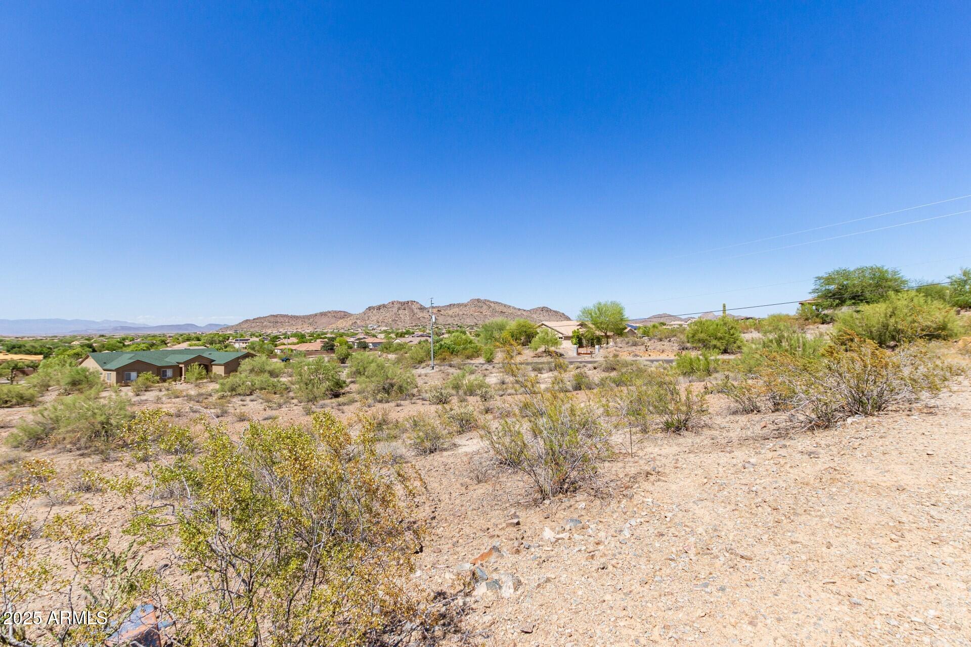 9303 West Briles Road, Unit 4 Peoria, AZ 85383 - Photo 7 of 20 a view of a large body of water with a building in the background