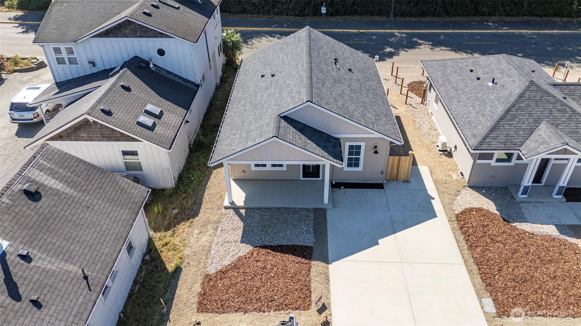 117 7th Street Southwest Long Beach, WA 98631 - Photo 22 of 25 an aerial view of a house with a yard