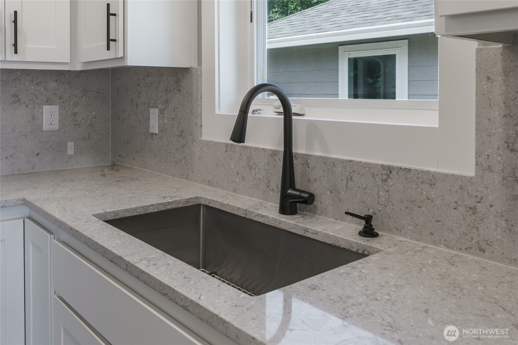 117 7th Street Southwest Long Beach, WA 98631 - Photo 6 of 25 a close view of sink and tap