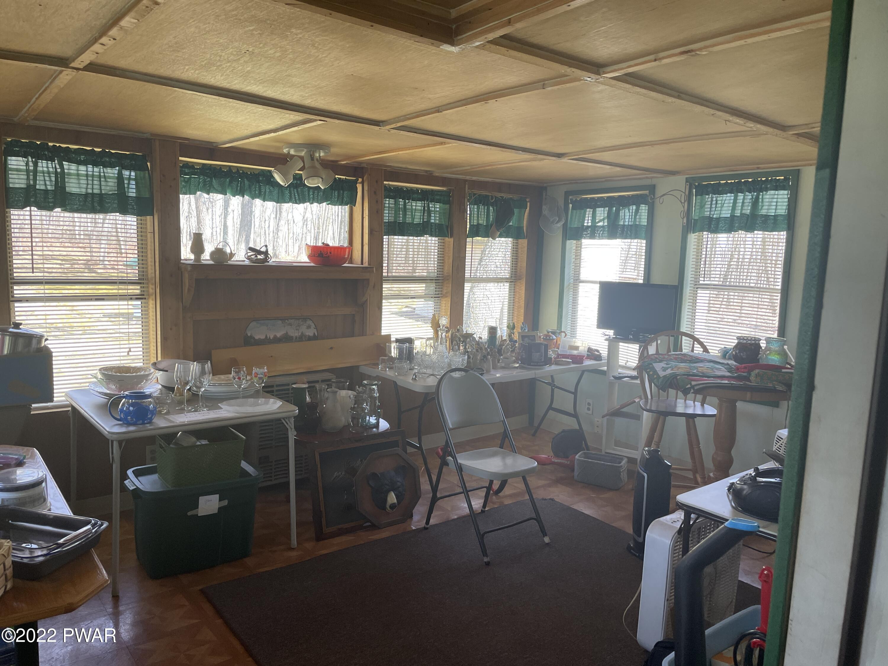 102 Galahad Road Greeley, PA 18425 - Photo 9 of 22 Heated Sunroom