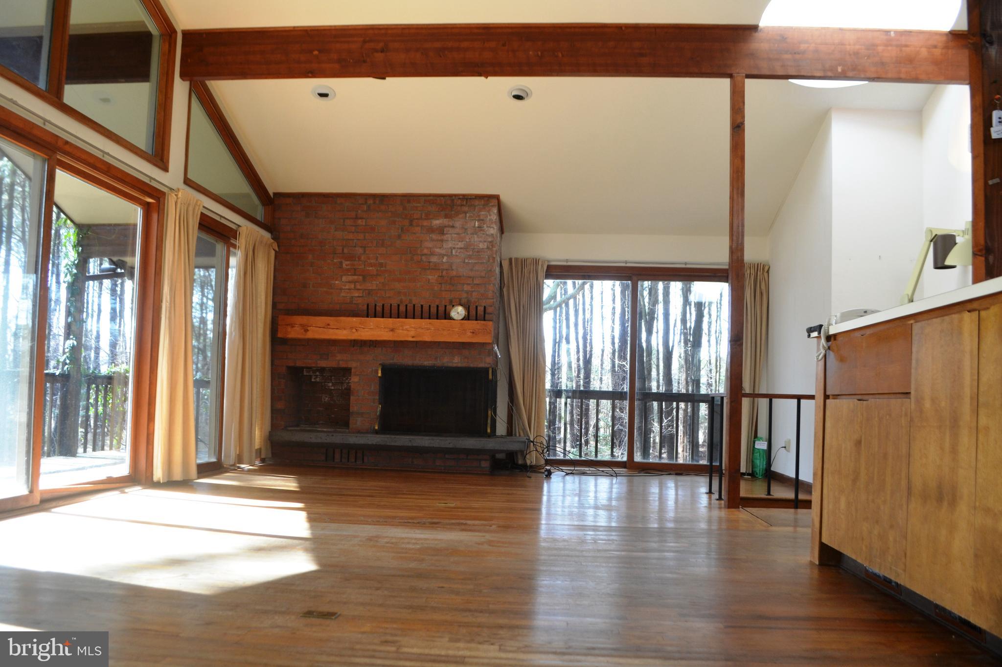 7223 Drum Point Road St. Michaels, MD 21663 - Photo 7 of 38 a view of an entryway with wooden floor