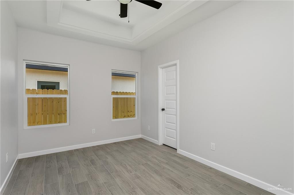 2302 San Pascual Street San Juan, TX 78589 - Photo 11 of 13 an empty room with windows and closet