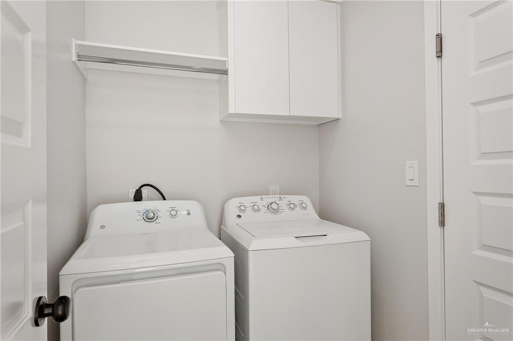 2302 San Pascual Street San Juan, TX 78589 - Photo 12 of 13 a utility room with dryer and washer