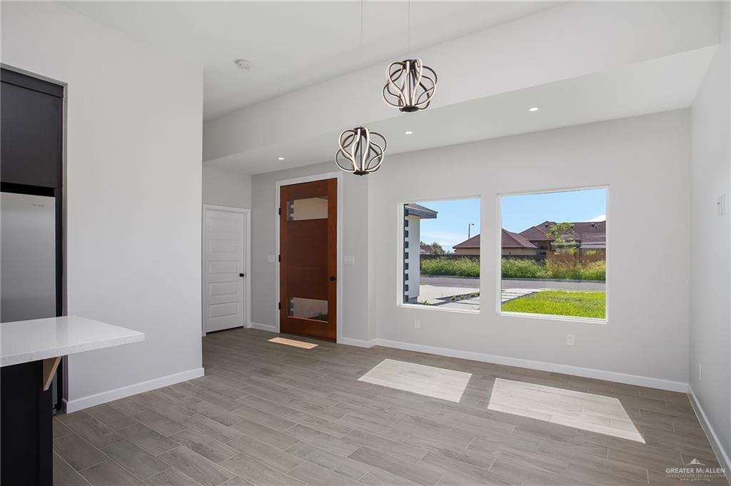 2302 San Pascual Street San Juan, TX 78589 - Photo 2 of 13 a view of an entryway with wooden floor