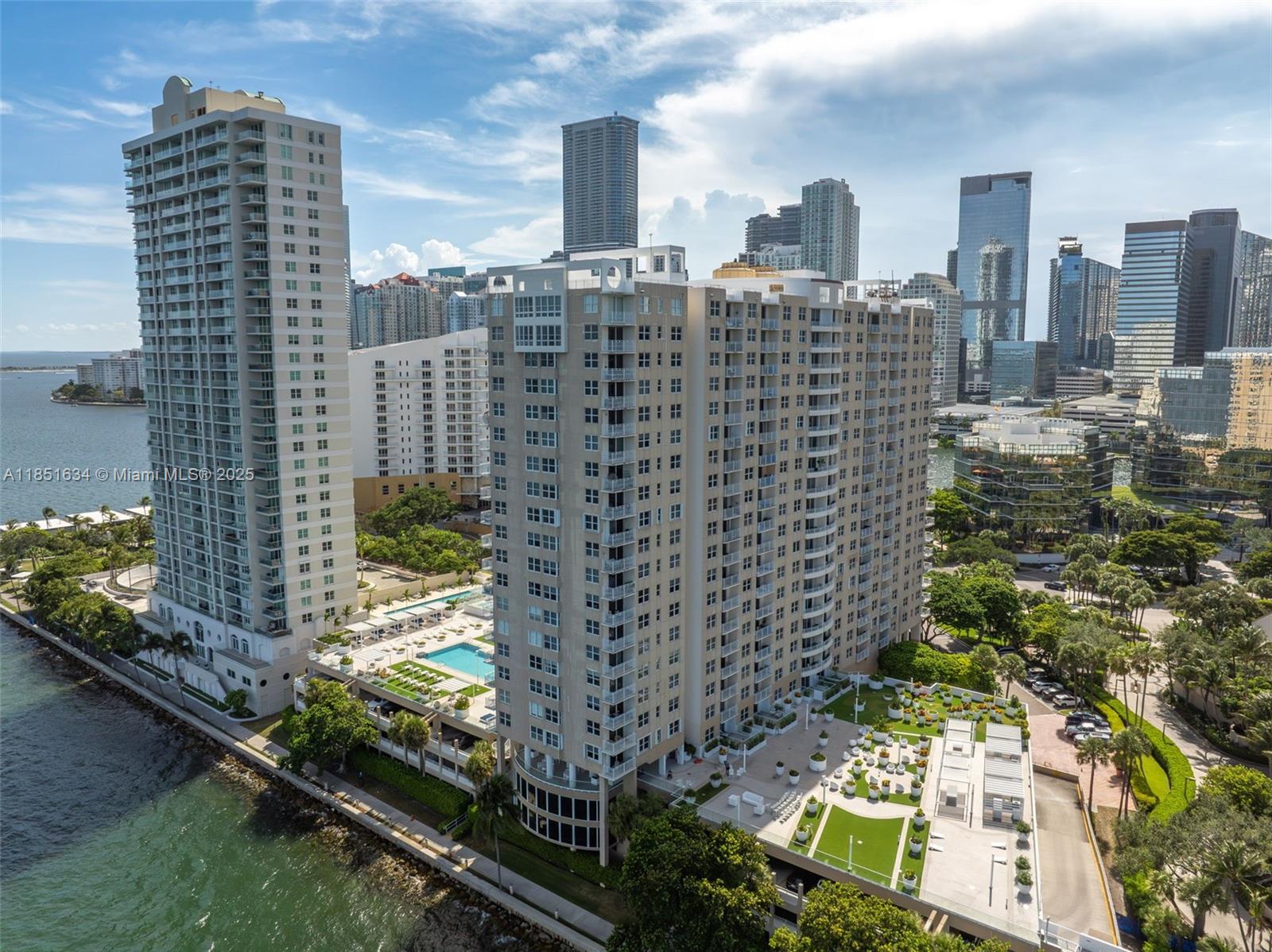 a view of a city with tall buildings