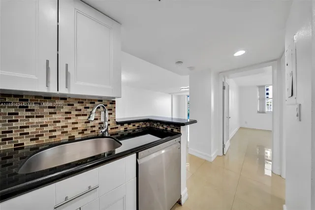 a bathroom with a shower and a toilet