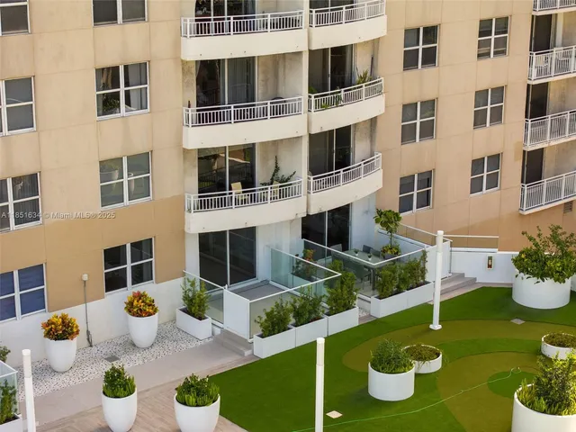 a view of a city with tall buildings