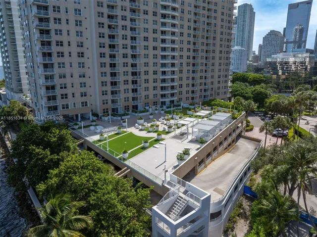 an aerial view of a house with a garden