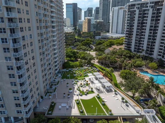 a view of a city with tall buildings
