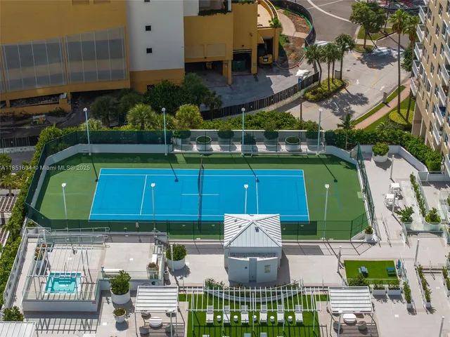 a front view of a building with large windows