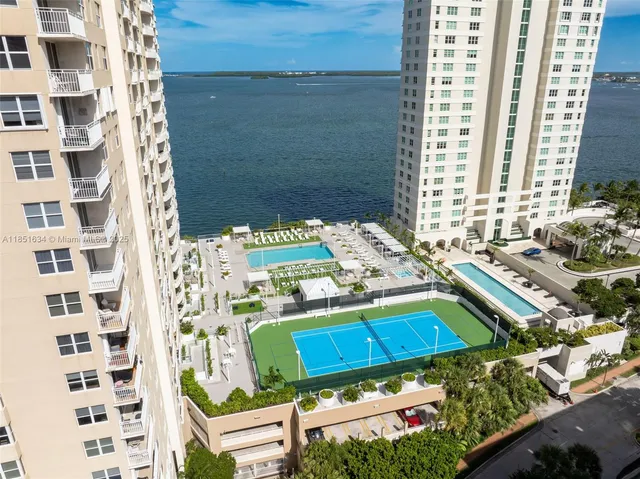 a big room with closet and windows