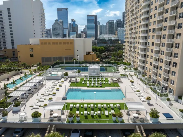 a view of bedroom with wooden floor