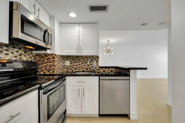 a view of staircase with white walls