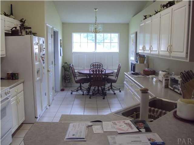 8344 Sphere Way Pensacola, FL 32514 - Photo 6 of 14 Another view of the kitchen, look @ all the cabinet space