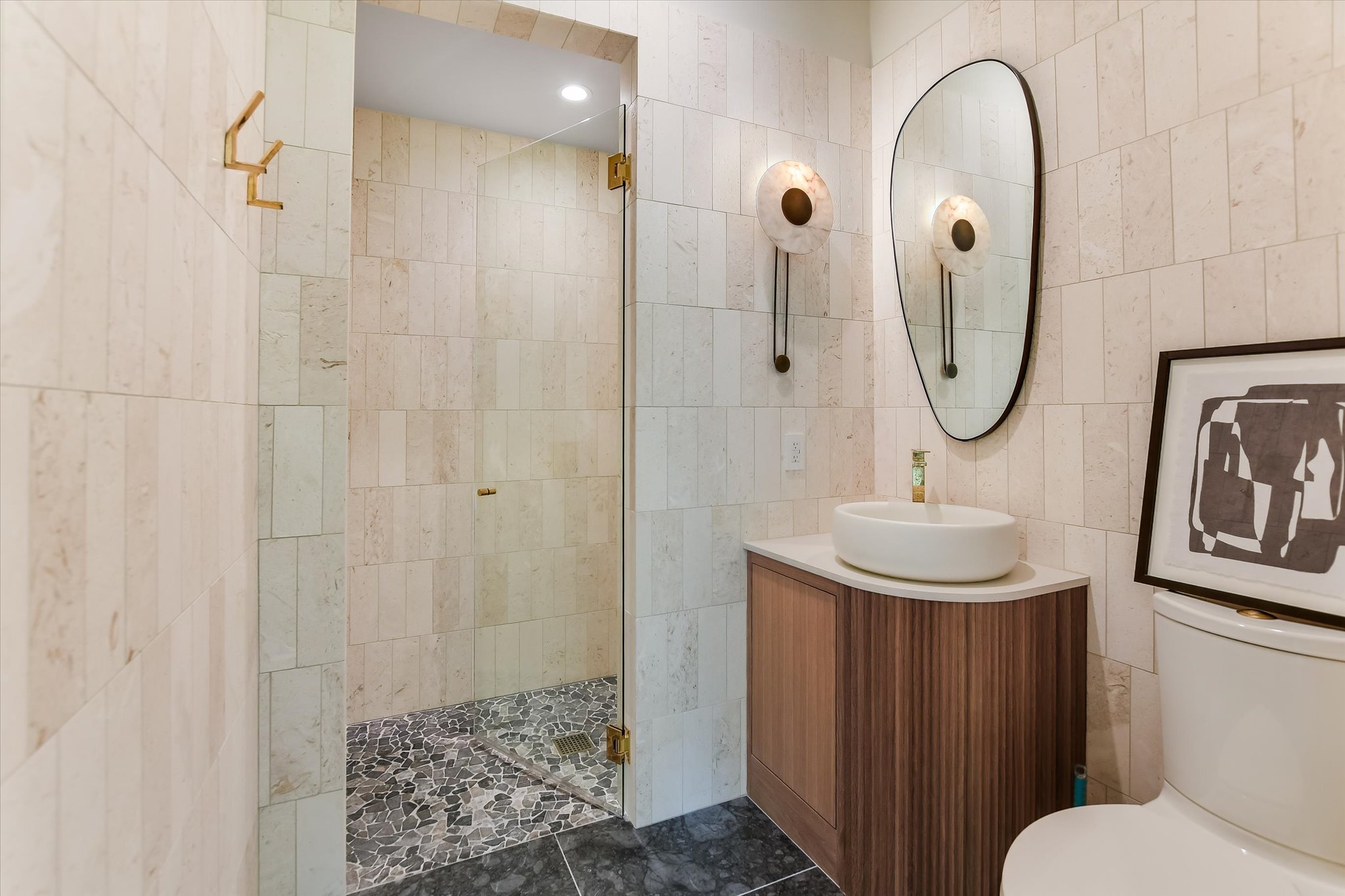2405 Deer Pass Austin, TX 78746 - Photo 13 of 38 a bathroom with a sink and a mirror