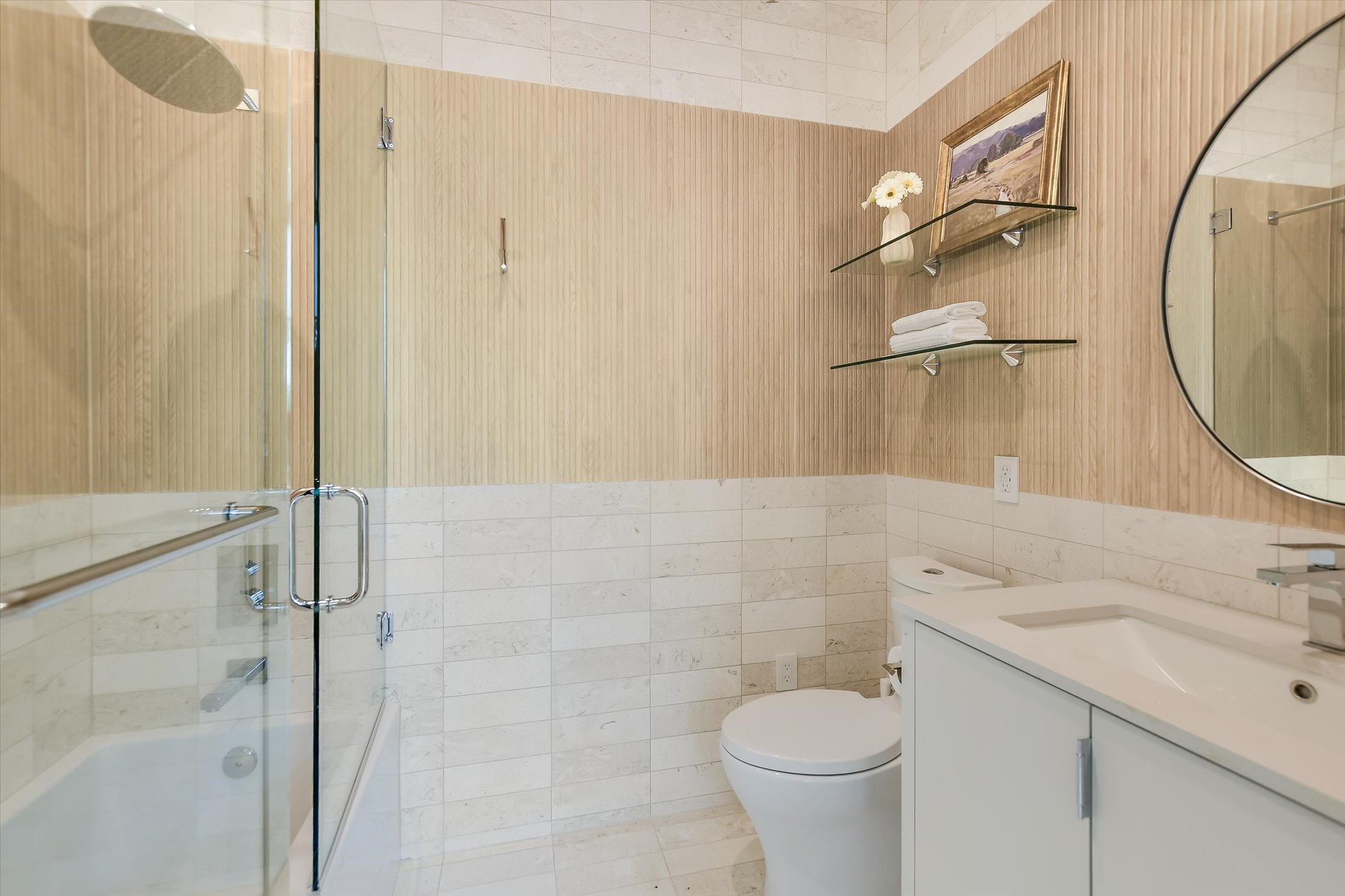 2405 Deer Pass Austin, TX 78746 - Photo 21 of 38 a bathroom with a sink a toilet and shower