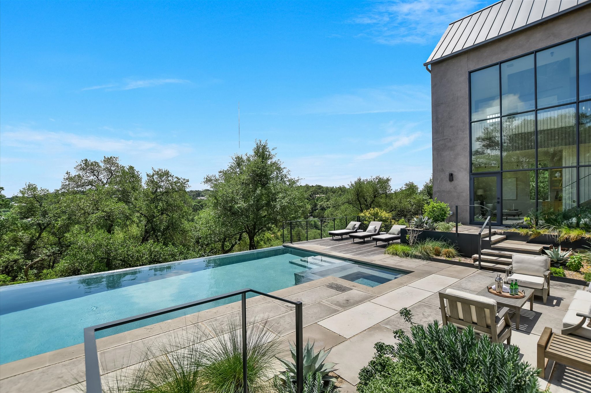 2405 Deer Pass Austin, TX 78746 - Photo 31 of 38 a view of swimming pool with outdoor seating and plants