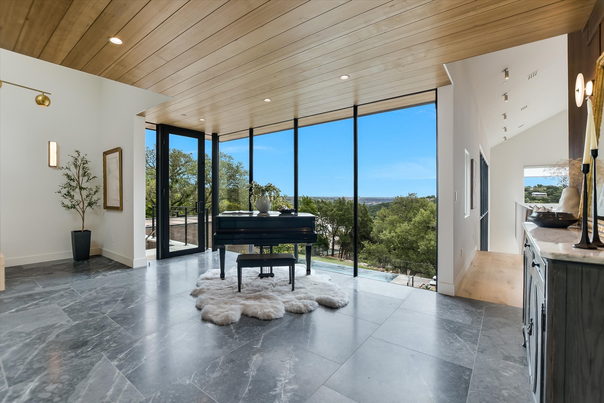 2405 Deer Pass Austin, TX 78746 - Photo 4 of 38 Floor-to-ceiling windows with expansive outdoor scenery