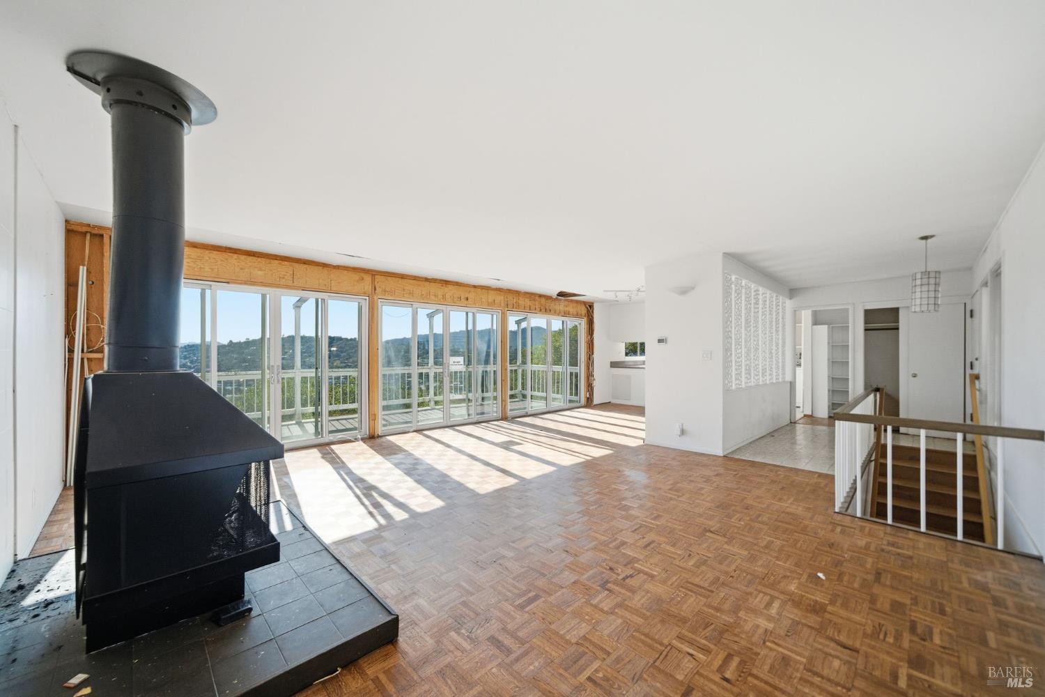101 Round Hill Road Tiburon, CA 94920 - Photo 2 of 22 a view of a bedroom with furniture and windows