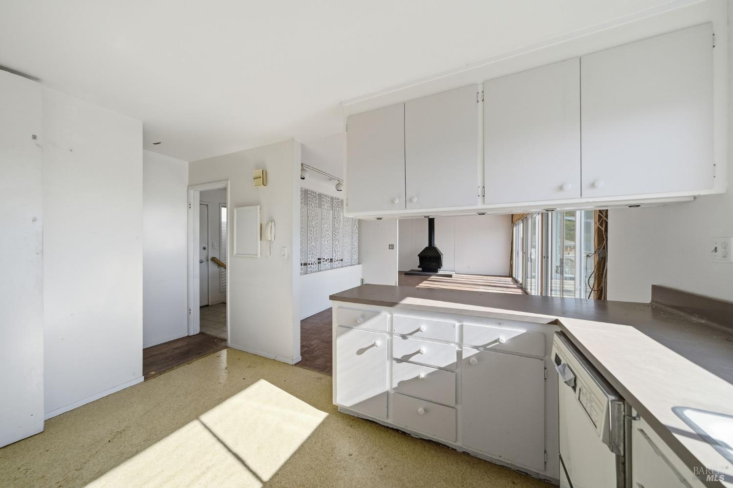 101 Round Hill Road Tiburon, CA 94920 - Photo 9 of 22 a view of a kitchen with cabinets and appliances