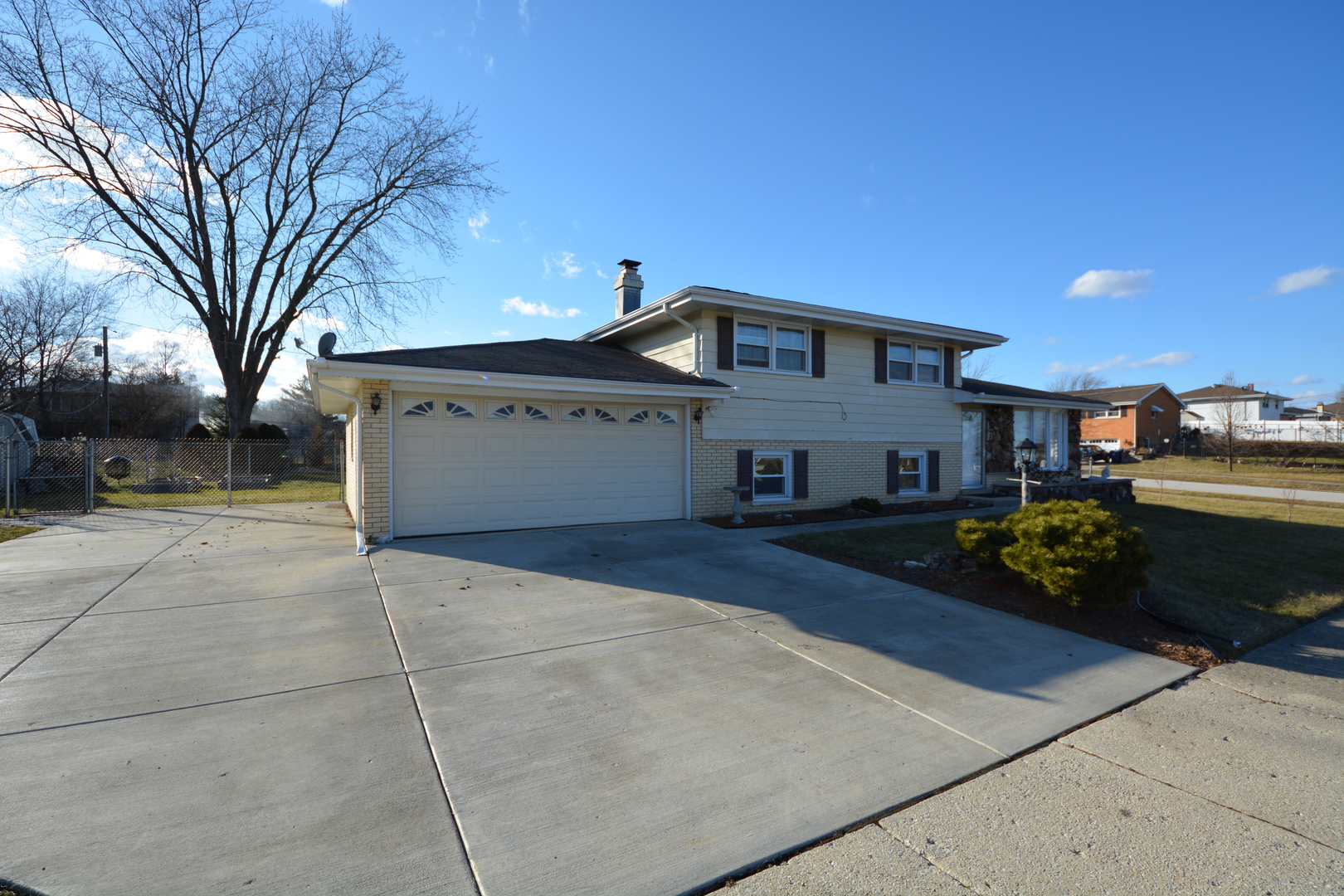 8029 West 90th Street Hickory Hills, IL 60457 - Photo 2 of 23 a front view of a house with a yard