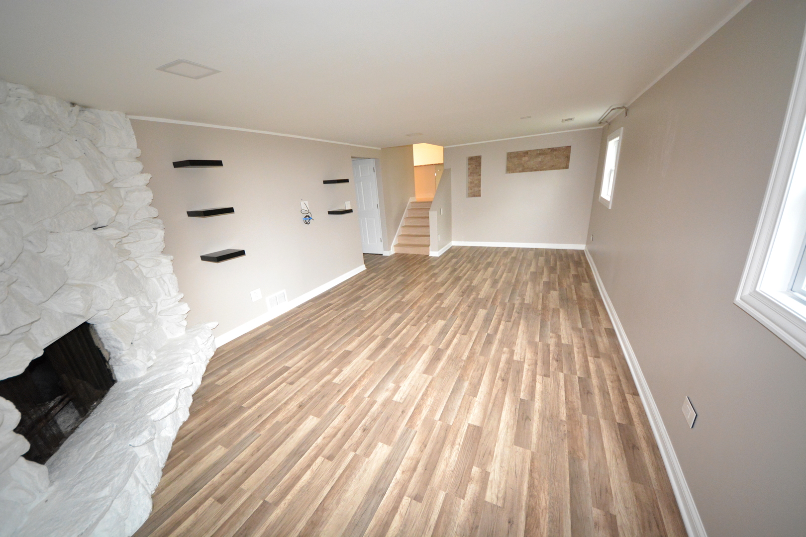 8029 West 90th Street Hickory Hills, IL 60457 - Photo 11 of 23 a view of a bedroom with wooden floor and windows