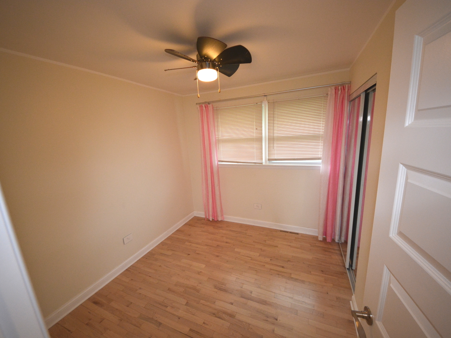 8029 West 90th Street Hickory Hills, IL 60457 - Photo 17 of 23 an empty room with windows and closet