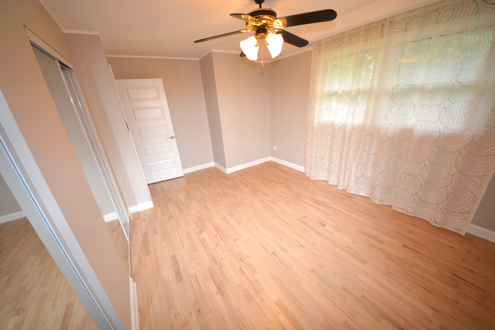 8029 West 90th Street Hickory Hills, IL 60457 - Photo 19 of 23 a view of empty room with wooden floor