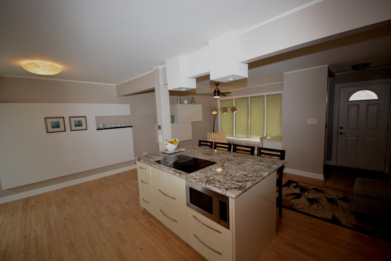 8029 West 90th Street Hickory Hills, IL 60457 - Photo 6 of 23 a kitchen with a stove and a wooden floor