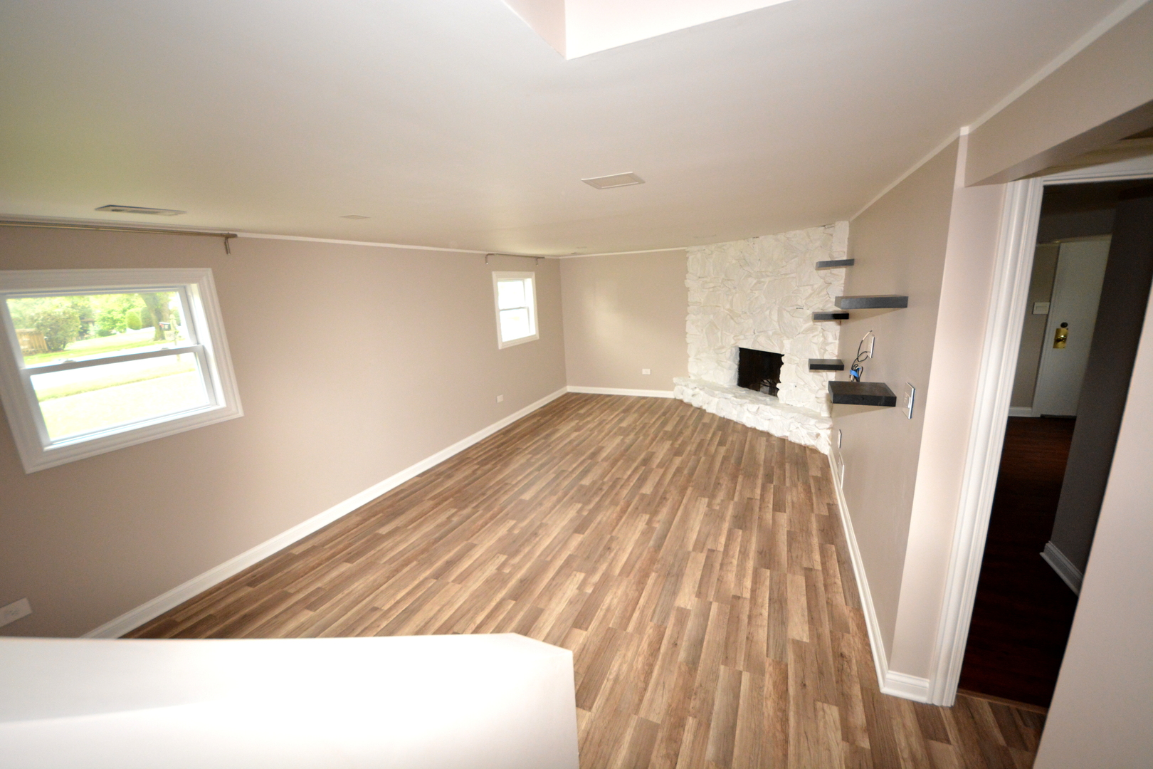8029 West 90th Street Hickory Hills, IL 60457 - Photo 10 of 23 wooden floor in an empty room with a window