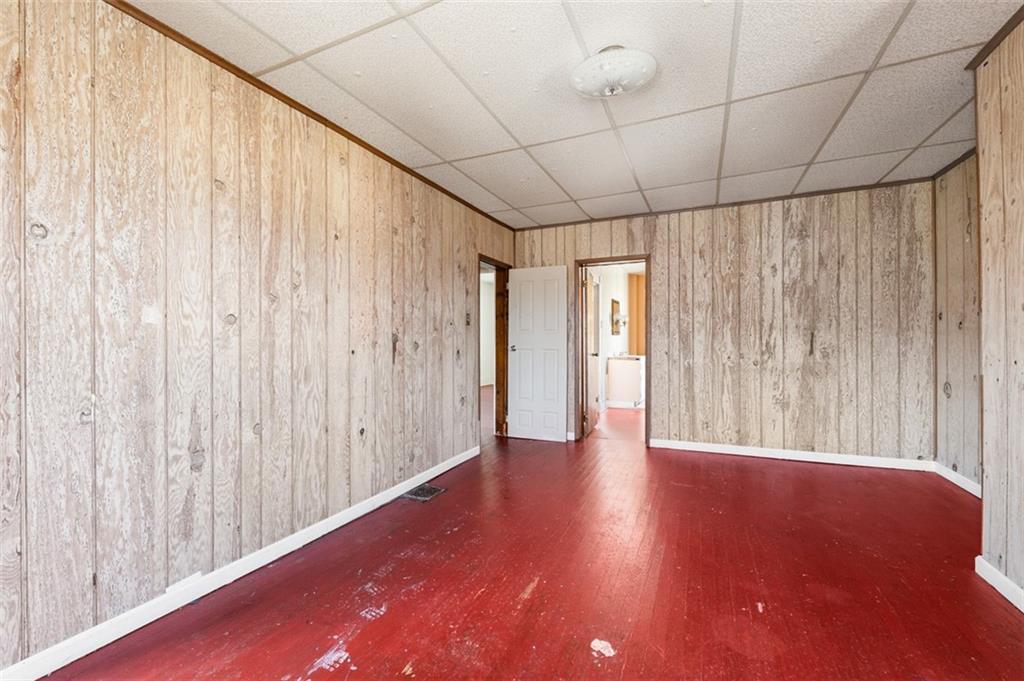 303 Agnew Road Jeannette, PA 15644 - Photo 17 of 28 a view of a room with wooden walls