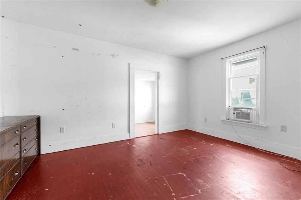 303 Agnew Road Jeannette, PA 15644 - Photo 19 of 28 an empty room with windows