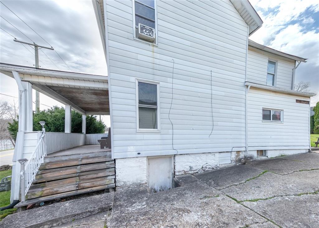 303 Agnew Road Jeannette, PA 15644 - Photo 24 of 28 a view of a house with a yard