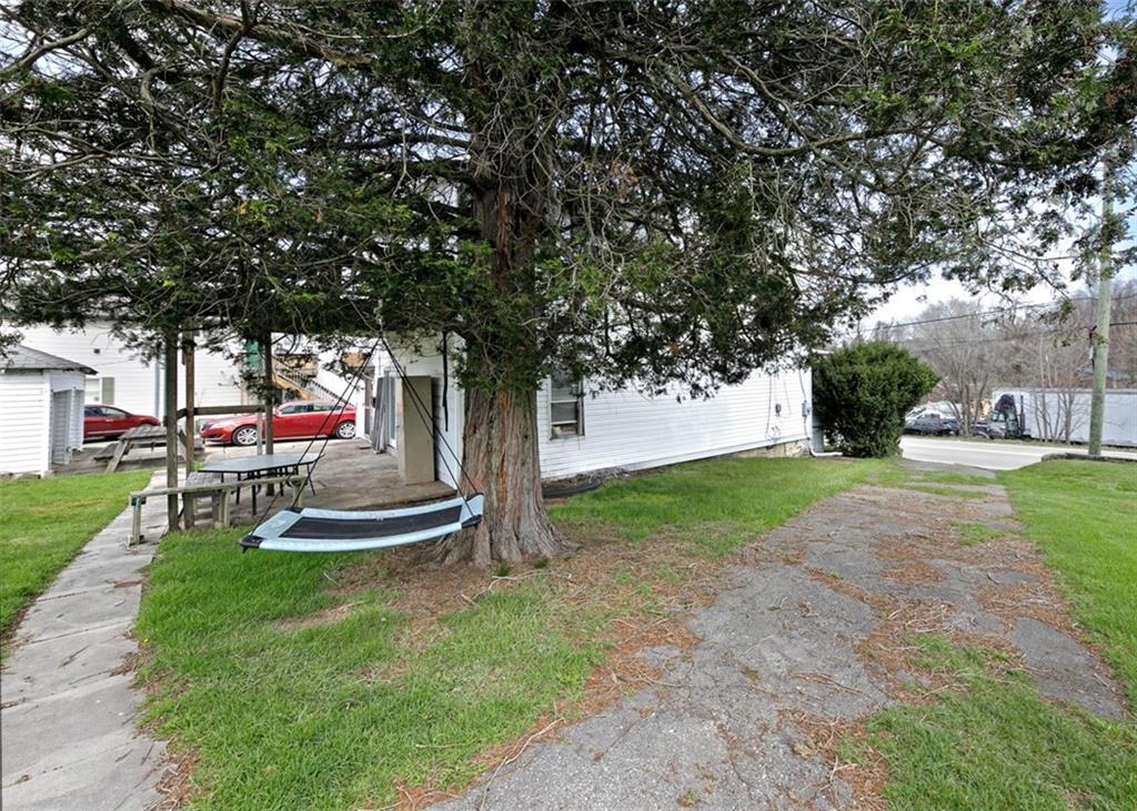 303 Agnew Road Jeannette, PA 15644 - Photo 25 of 28 a couple of table and chairs in the garden