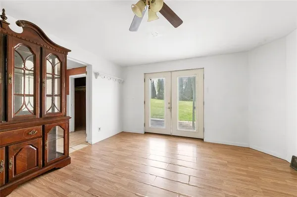 a view of entryway with wooden floor