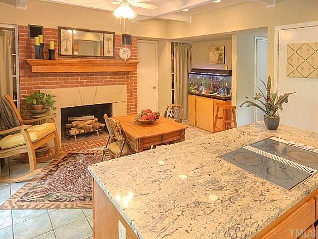 7422 Johnson Mill Road Bahama, NC 27503 - Photo 8 of 25 Attractive Wood Burning Fireplace in the Breakfast Room. Kitchen