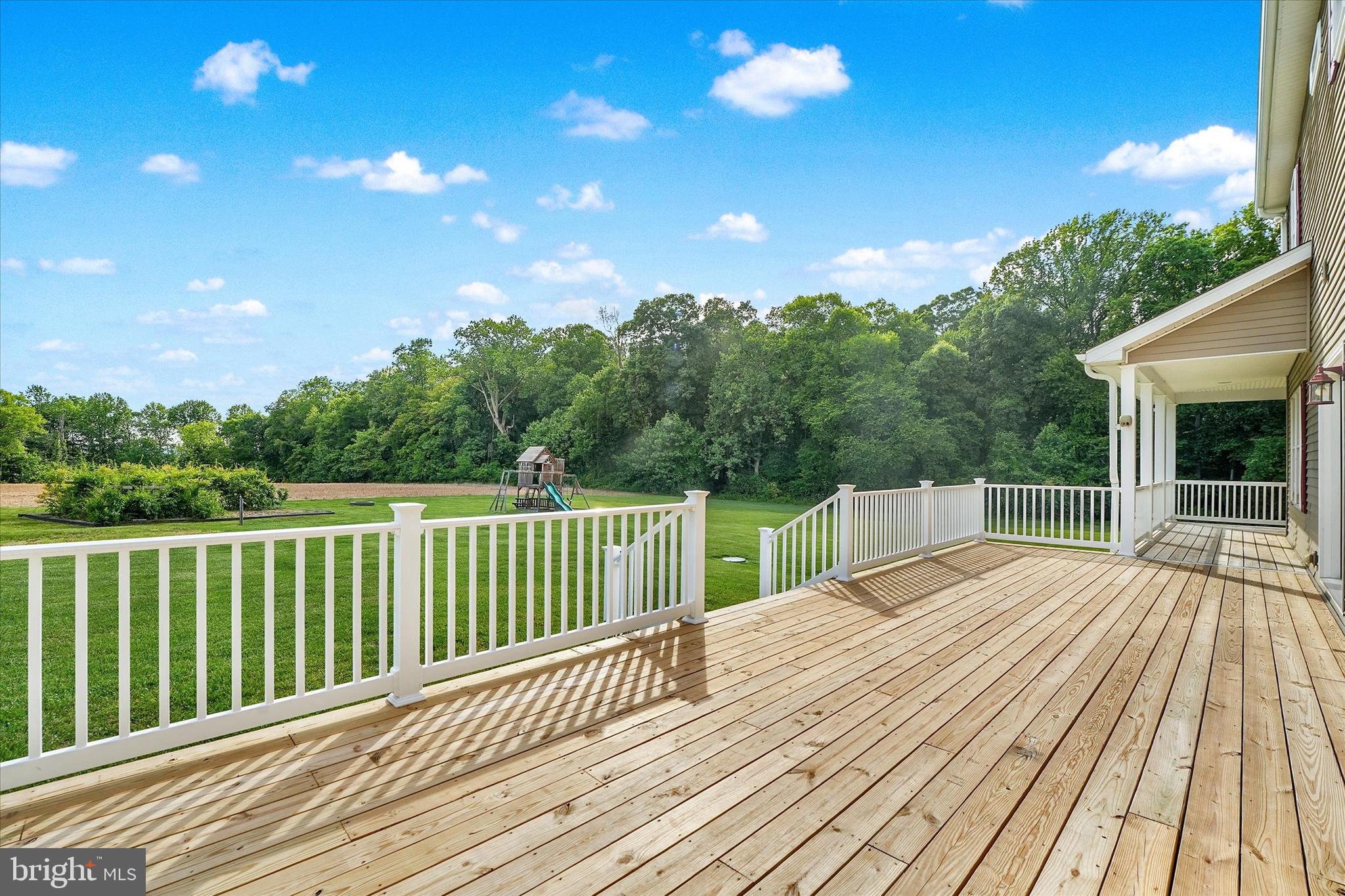 249 Floral Way Rising Sun, MD 21911 - Photo 14 of 65 a view of balcony with wooden floor and fence