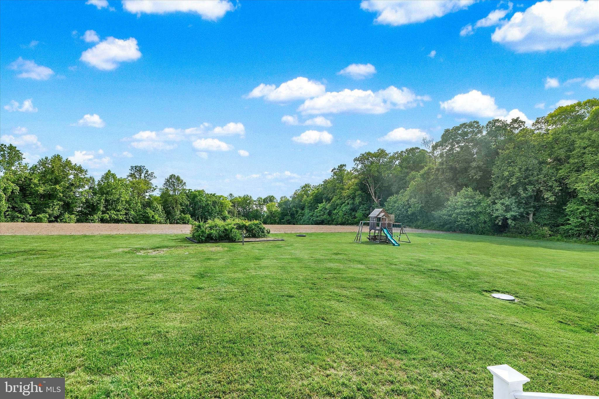 249 Floral Way Rising Sun, MD 21911 - Photo 15 of 65 a house view with a garden