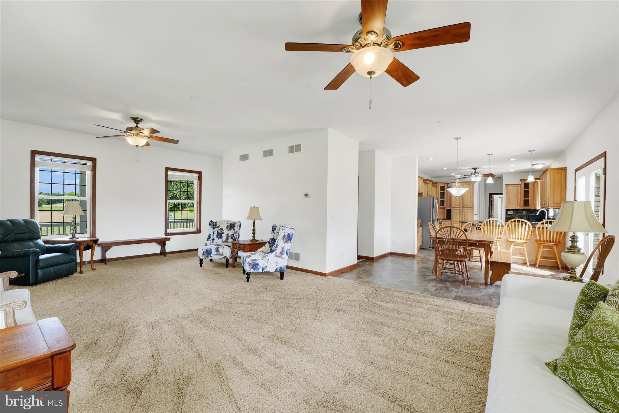 249 Floral Way Rising Sun, MD 21911 - Photo 24 of 65 a living room with furniture and kitchen view