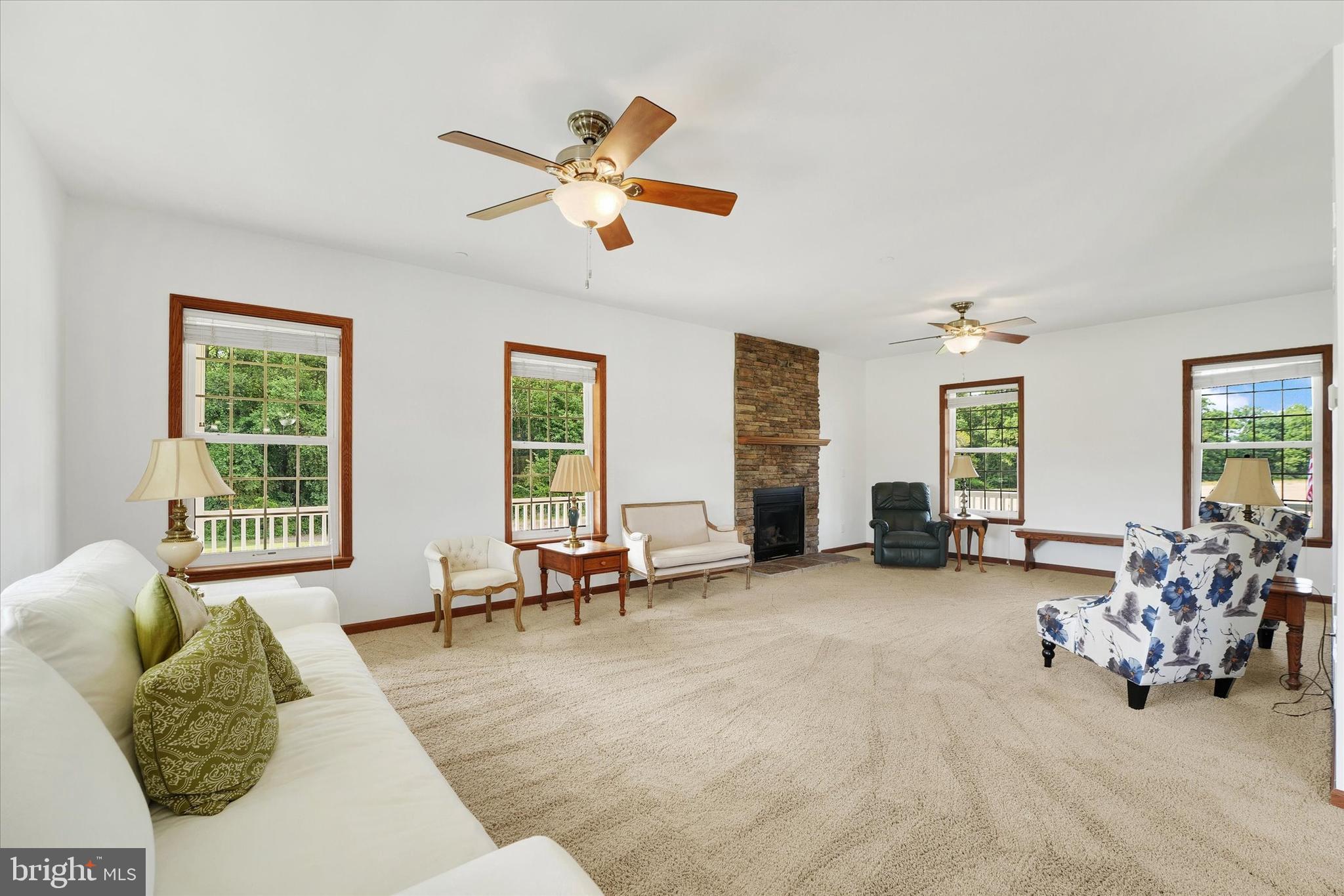 249 Floral Way Rising Sun, MD 21911 - Photo 25 of 65 a living room with furniture and large windows