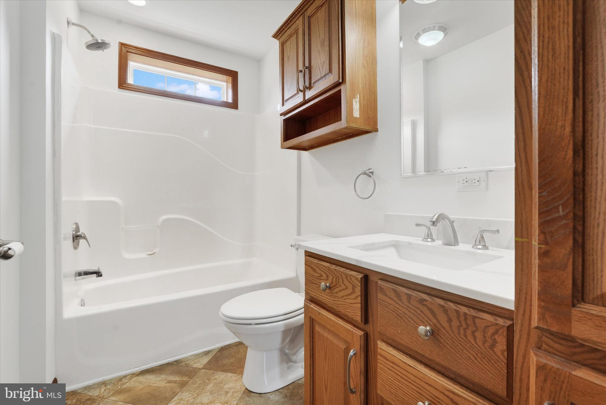 249 Floral Way Rising Sun, MD 21911 - Photo 38 of 65 a bathroom with a granite countertop sink toilet and shower