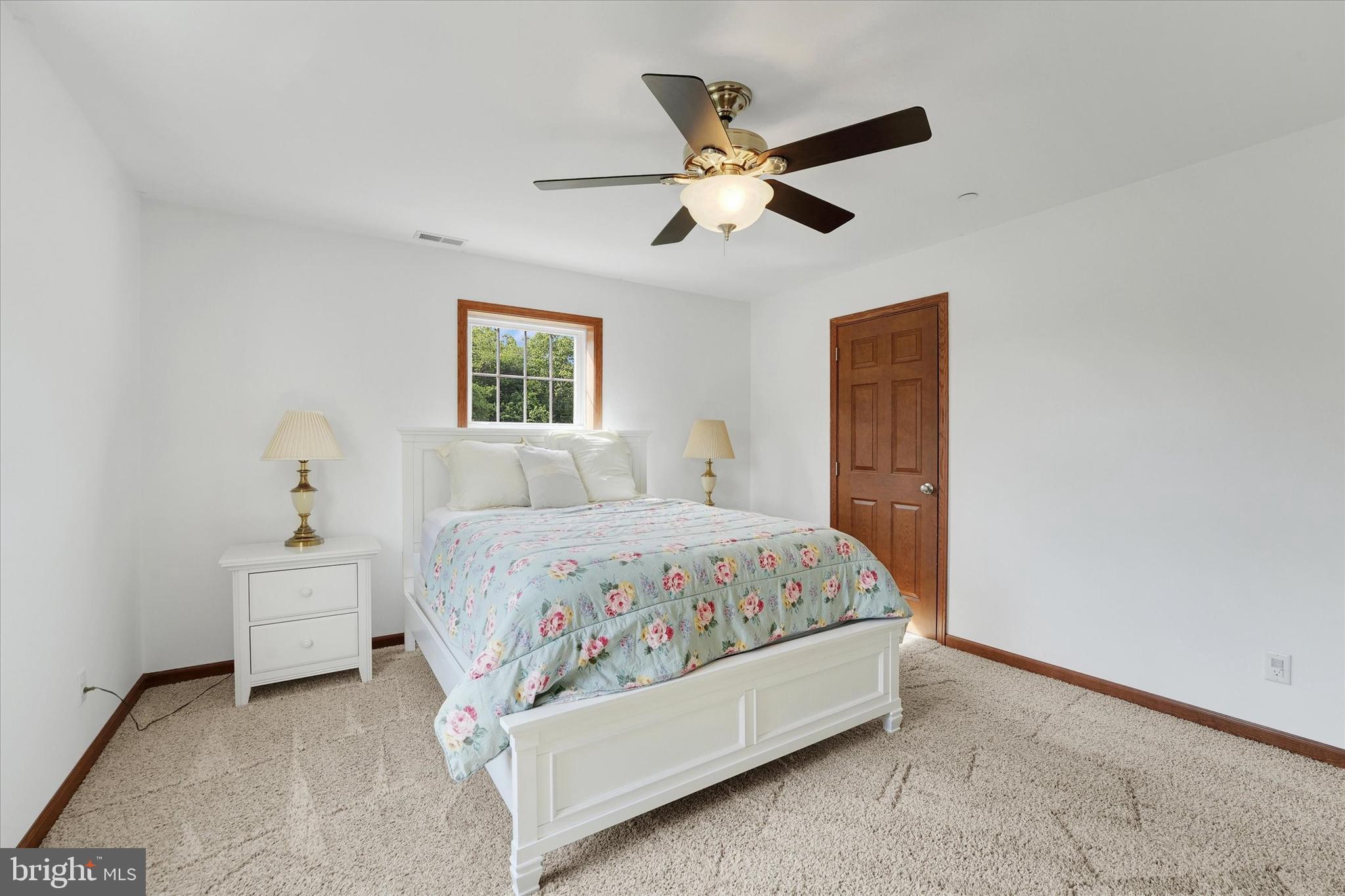 249 Floral Way Rising Sun, MD 21911 - Photo 43 of 65 a bedroom with a bed and window