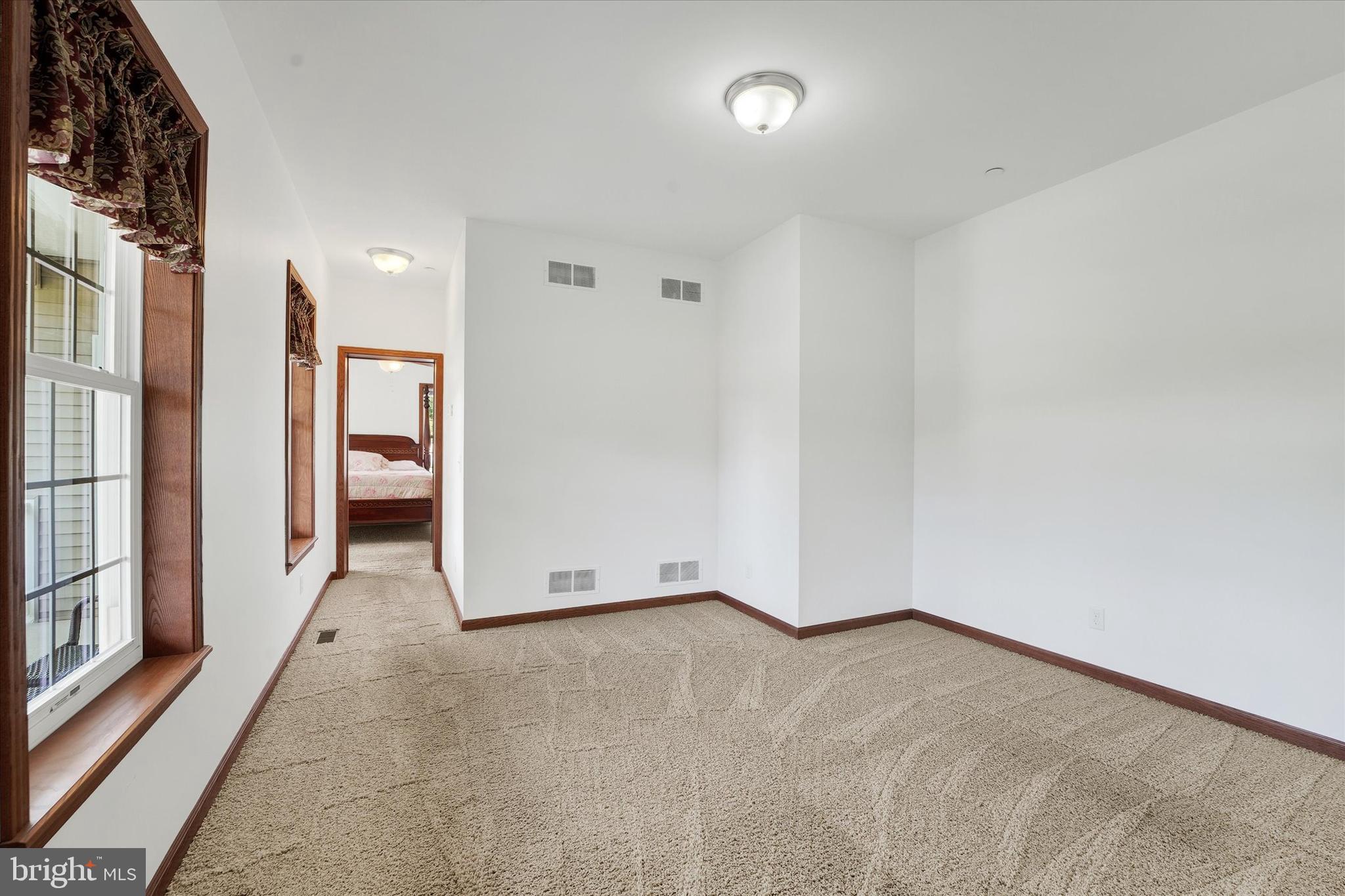 249 Floral Way Rising Sun, MD 21911 - Photo 47 of 65 an empty room with entrance and windows