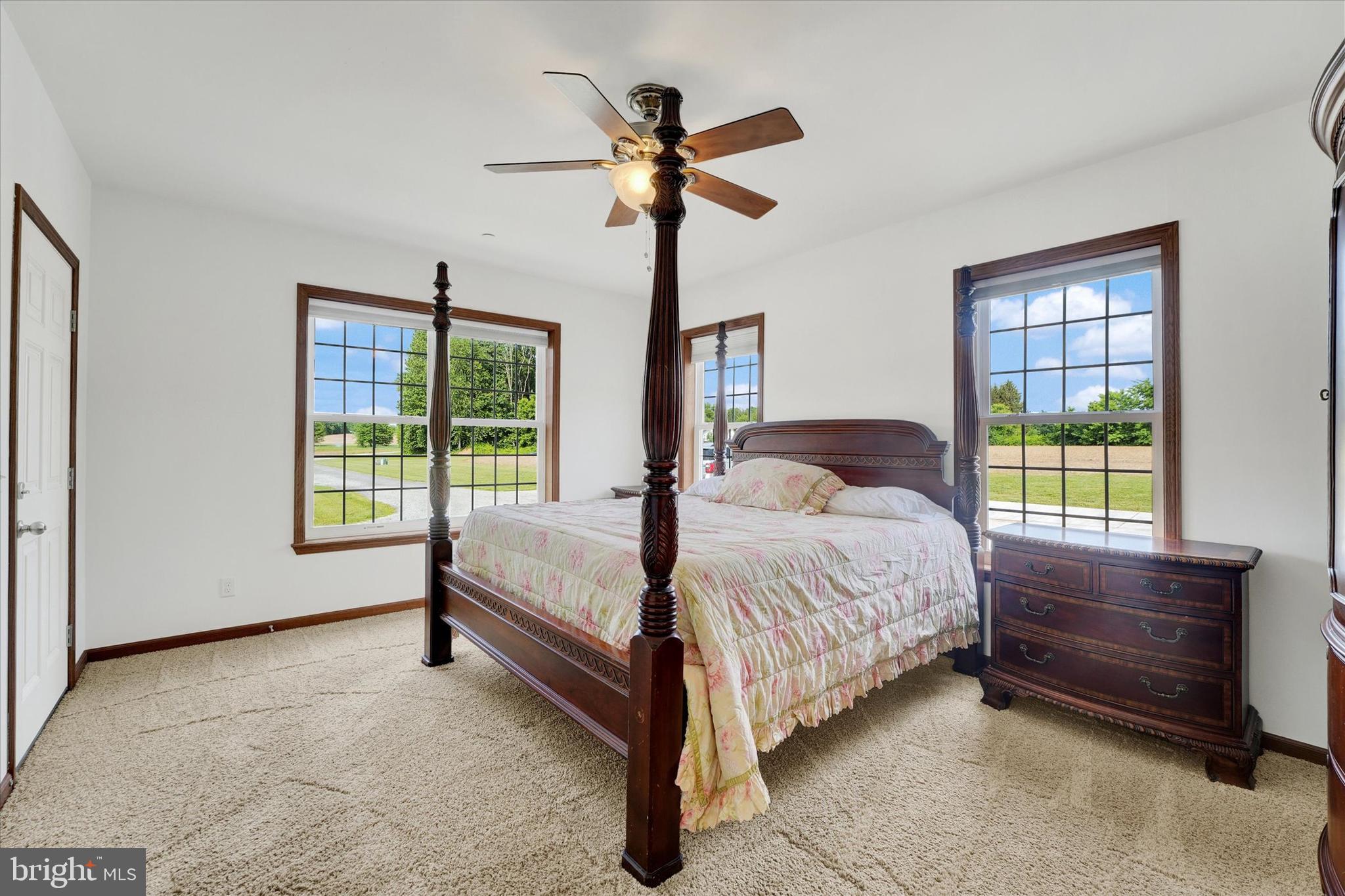 249 Floral Way Rising Sun, MD 21911 - Photo 48 of 65 a bedroom with a bed and a window