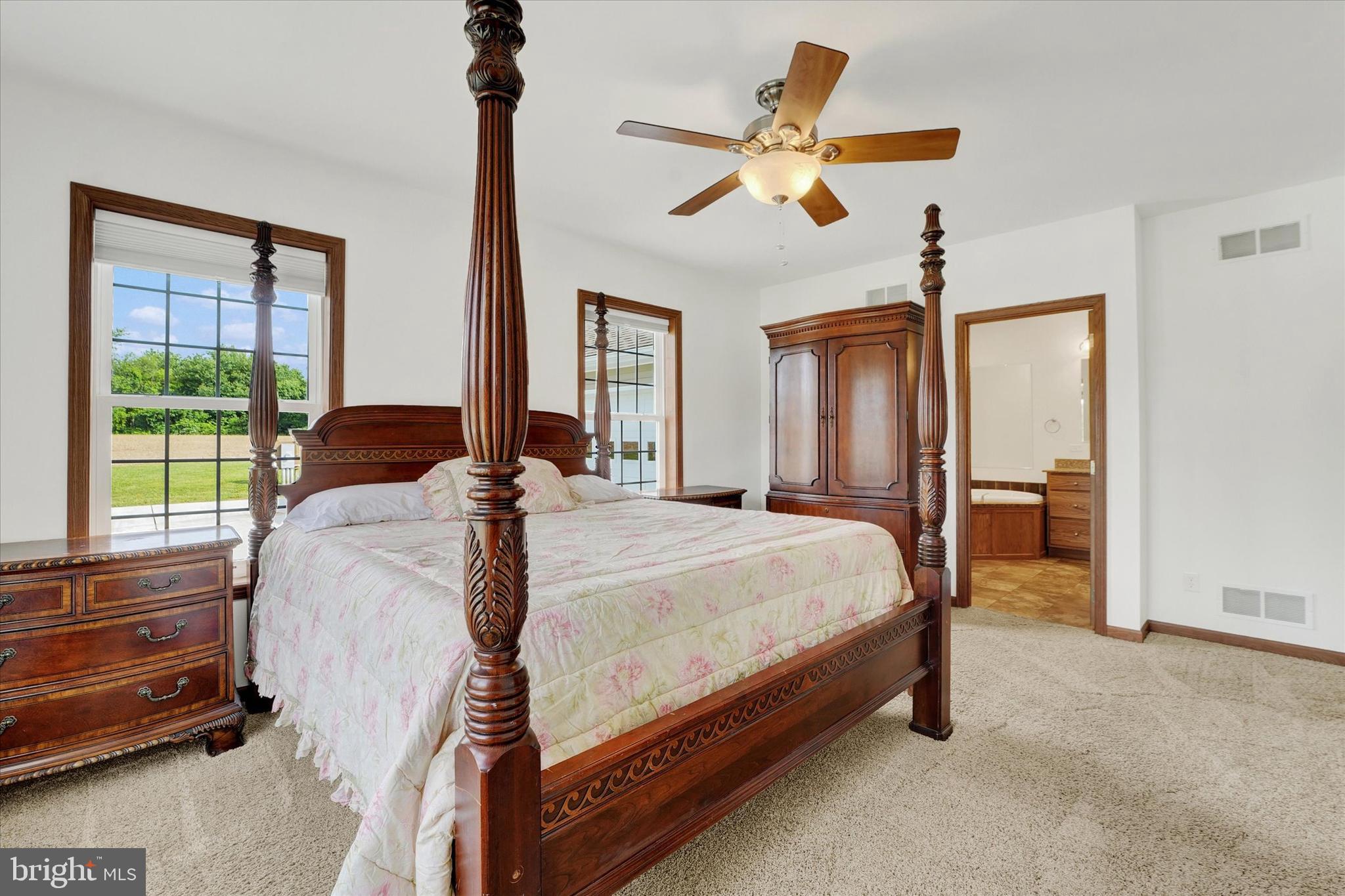 249 Floral Way Rising Sun, MD 21911 - Photo 52 of 65 a bed room with a bed and a window