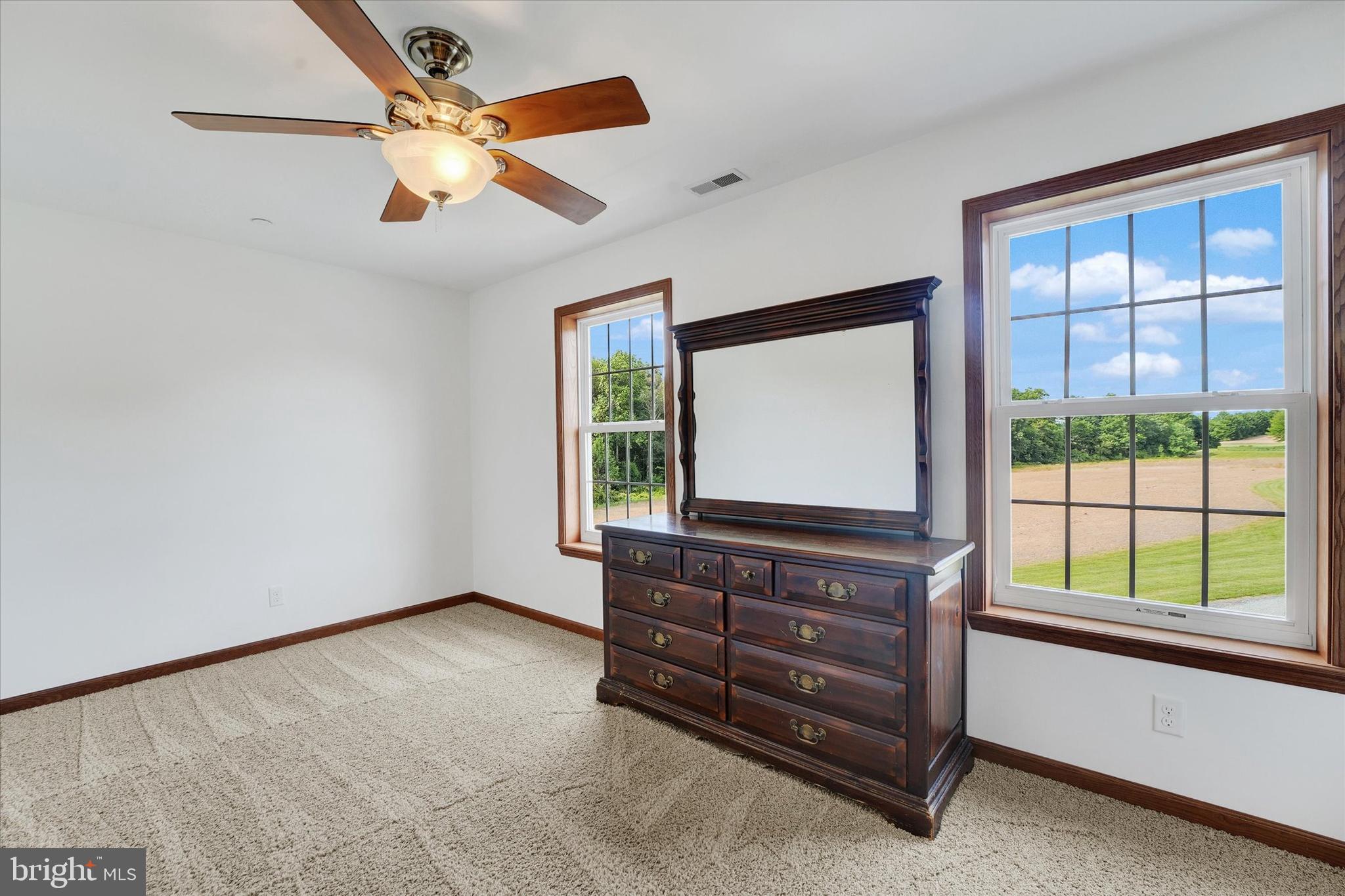 249 Floral Way Rising Sun, MD 21911 - Photo 55 of 65 a living room with furniture and a flat screen tv