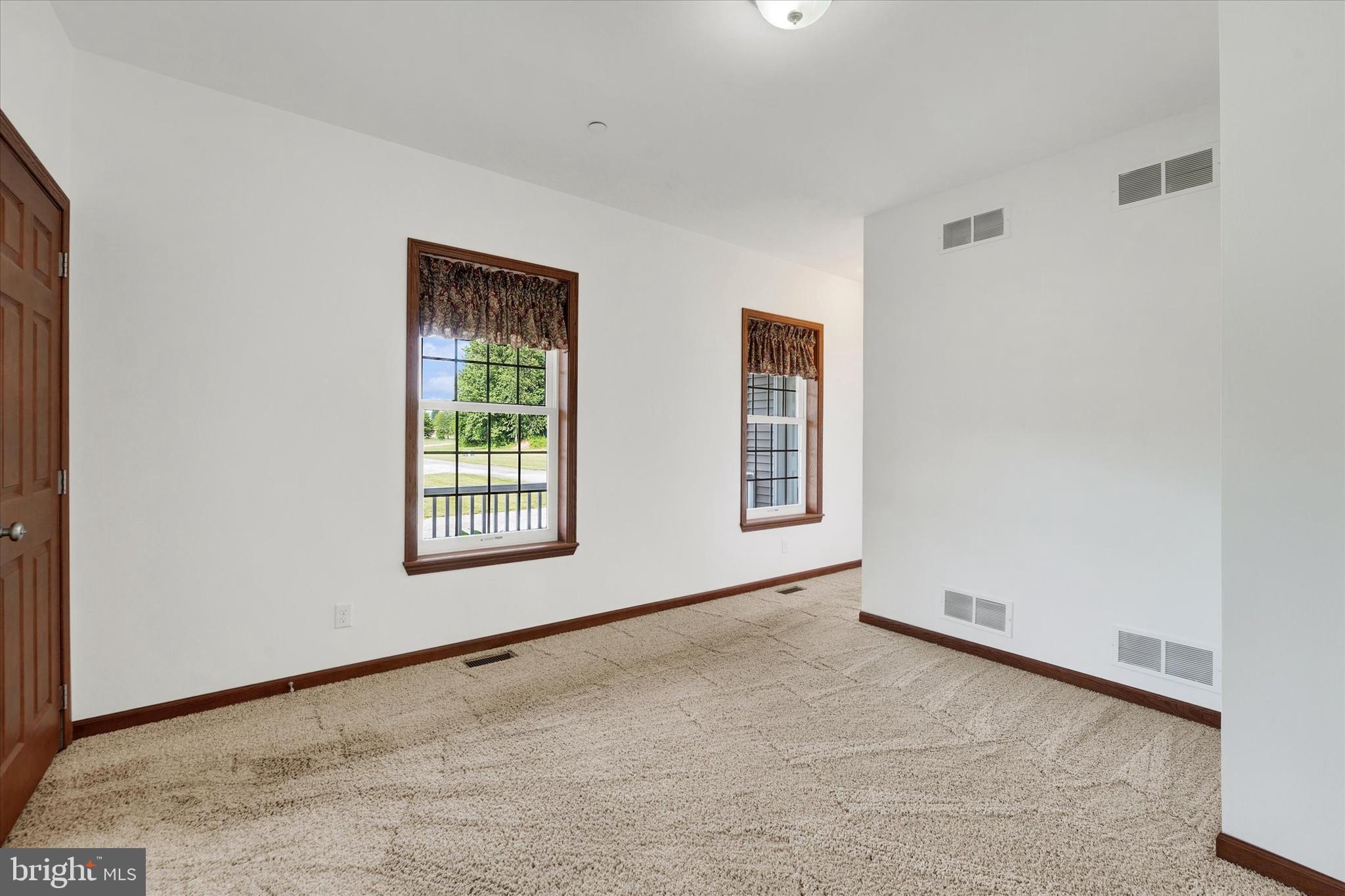 249 Floral Way Rising Sun, MD 21911 - Photo 59 of 65 a view of an empty room with a window